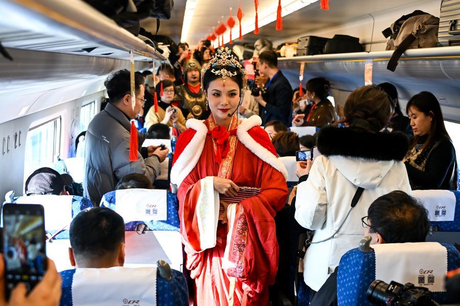 Passengers on a Fuxing bullet train in China
